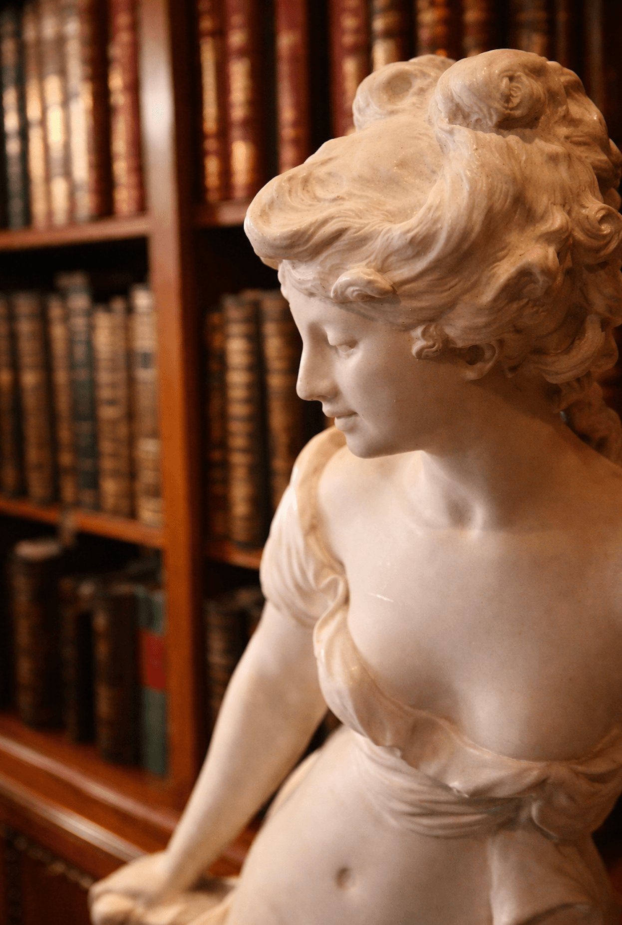 Statue and books at Moon River